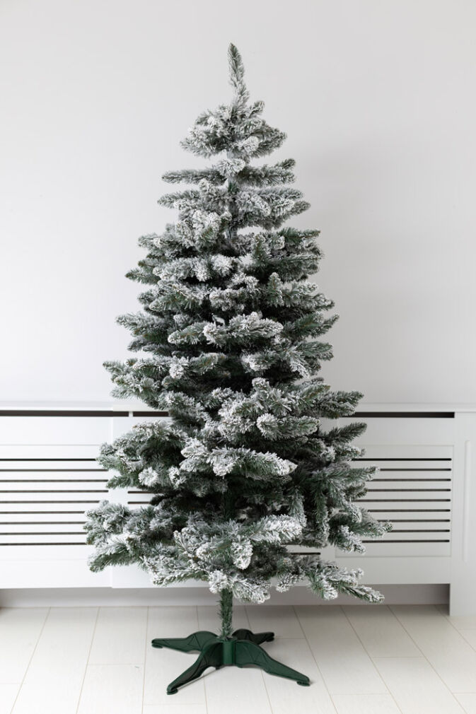 Snow-covered Christmas tree 210 cm